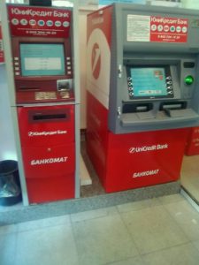 С помощью фирменных банкоматов